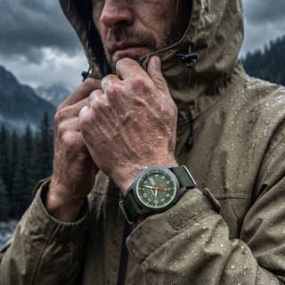 wearing infantry military field watch green in the raining day REVO-FW01-GN-GNN-AI03